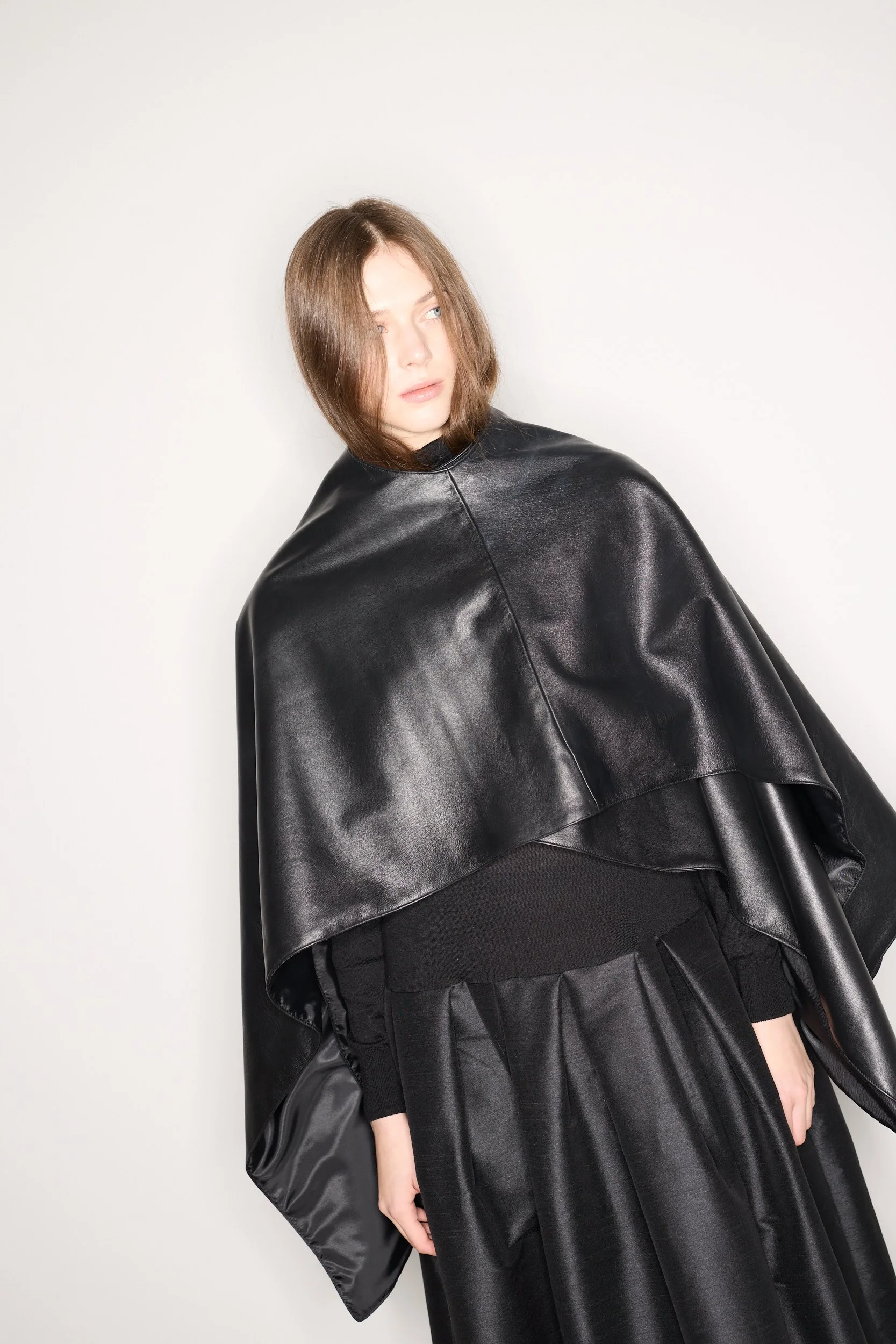 BLACK LEATHER CAPE — STUDIO CUT